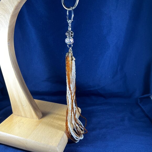 Accessories - Beaded Keychain Bag Charm With Orange & White Tassels And Silver Floral Accent